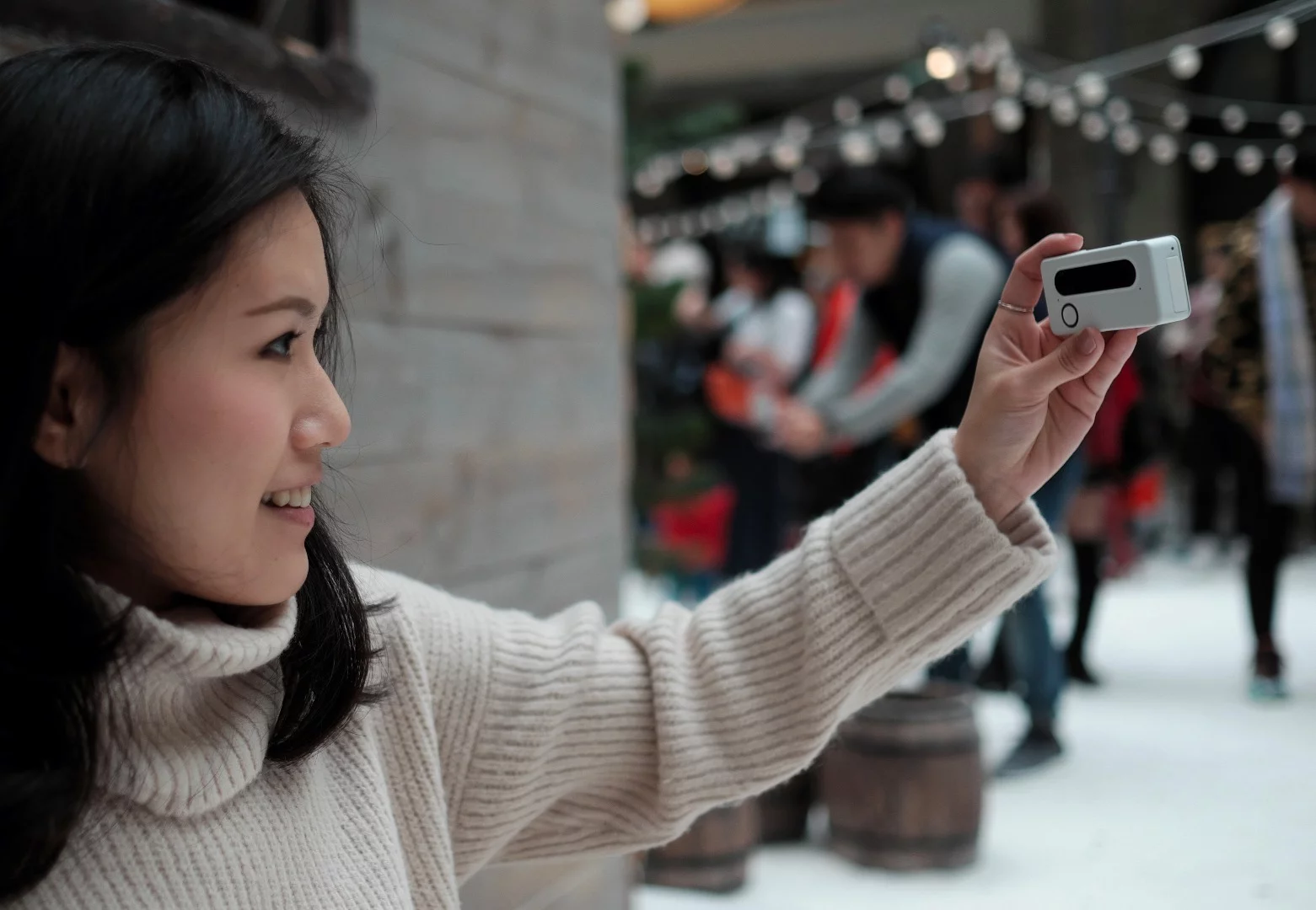 The dual lenses allow users to shoot wiggle-gram selfies