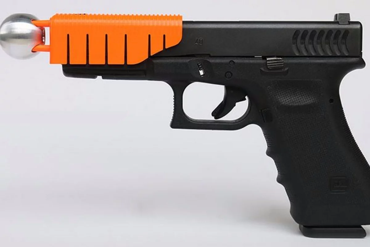 The Alternative hooks onto a standard semiautomatic pistol to reduce the velocity of a fired round