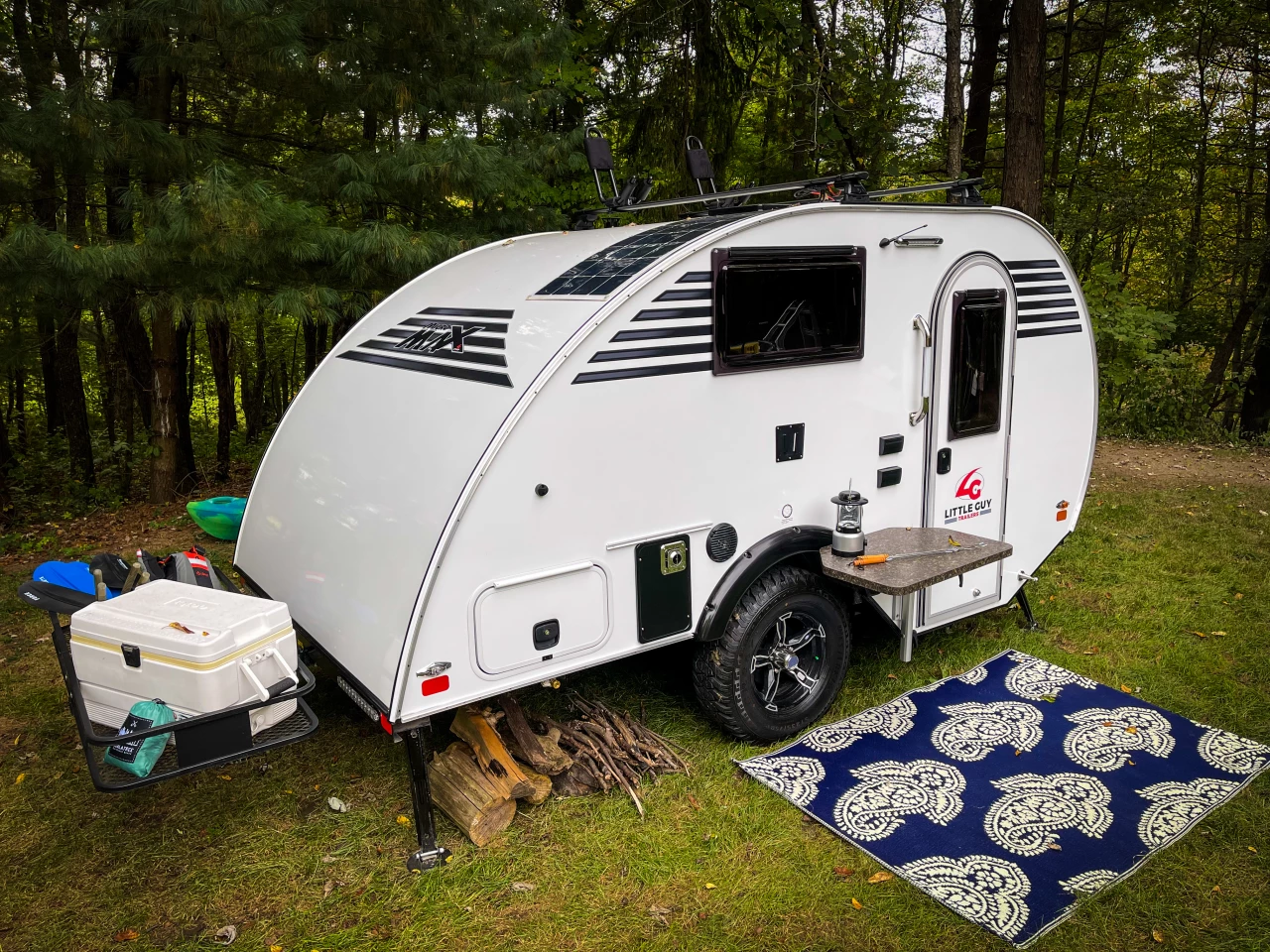 The Little Guy Micro Max camper includes a rear hitch receiver, shown here carrying a cargo tray