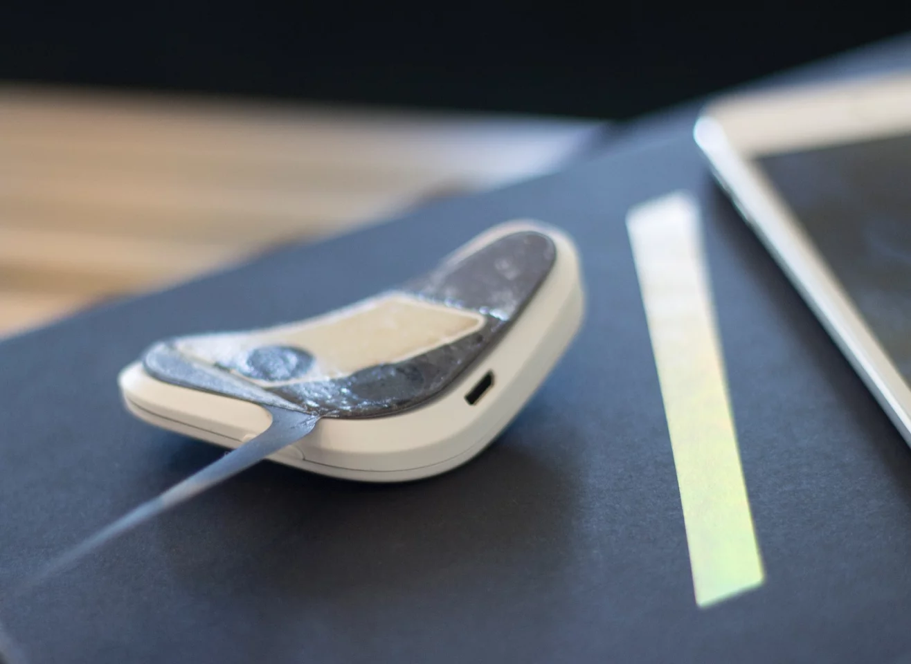 Backside of Thync, with sticky strip exposed