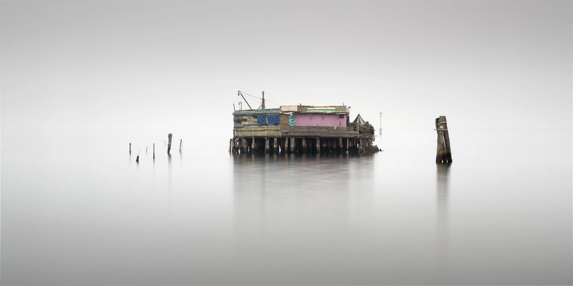 These fishing huts (Casoni) are built on stilts in the Venetian lagoon. The local fisherman use them to store their equipment in a safe place