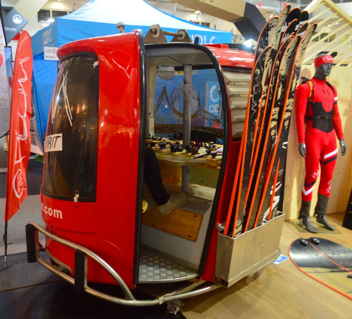 A gondola cabin serves as functional booth decor
