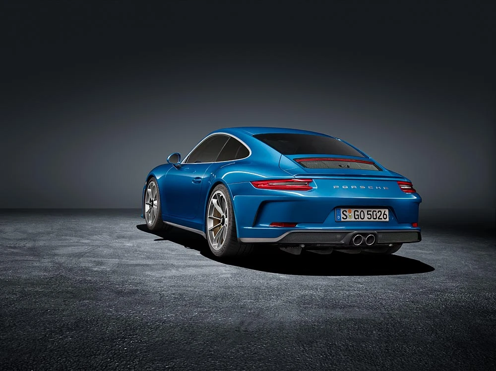 The flip-up wing on the Touring Package is the same as the one from the Carrera S