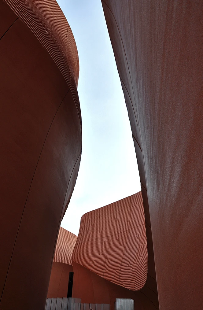 The UAE Pavilion features tall rippled walls, reflecting the United Arab Emirates' desert landscapes