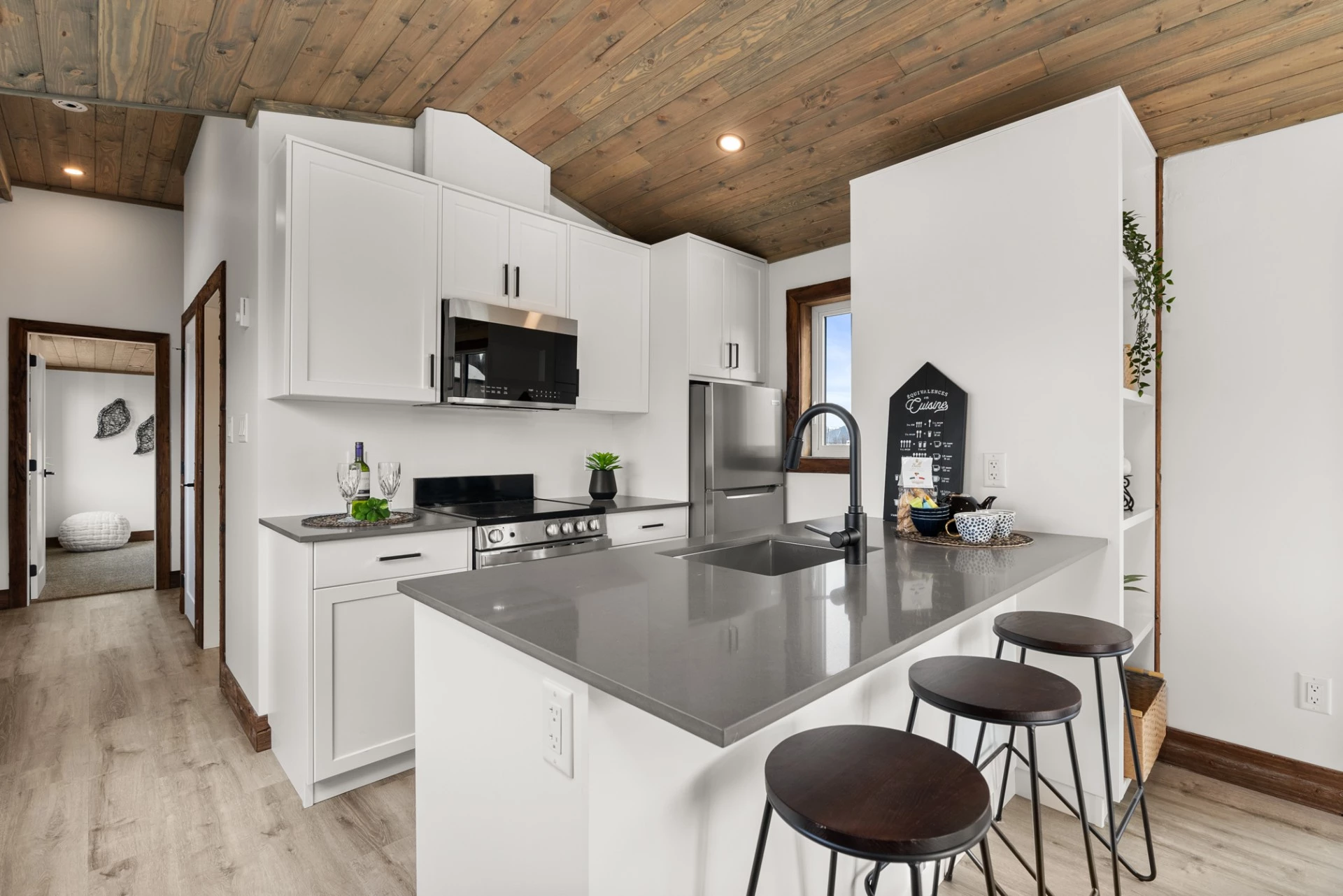 The Cypress' kitchen includes a breakfast bar for three