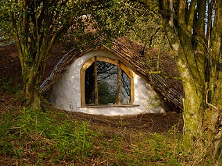 Simon Dale, with the help of his father in-law, has single-handedly built this low impact Hobbit house in the woodlands of West Wales (Photo: Simon Dale)