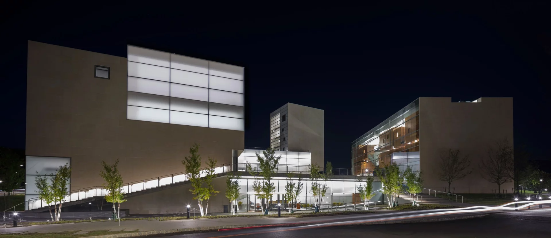 Lewis Arts Complex, Princeton University, Princeton, NJ, USA by Steven Holl Architects with BNIM-2. A winner under the "Schools and Universities" category of the 2018 International Architecture Awards, this building expands the performance and rehearsal spaces and features an outdoor plaza with a reflecting pool