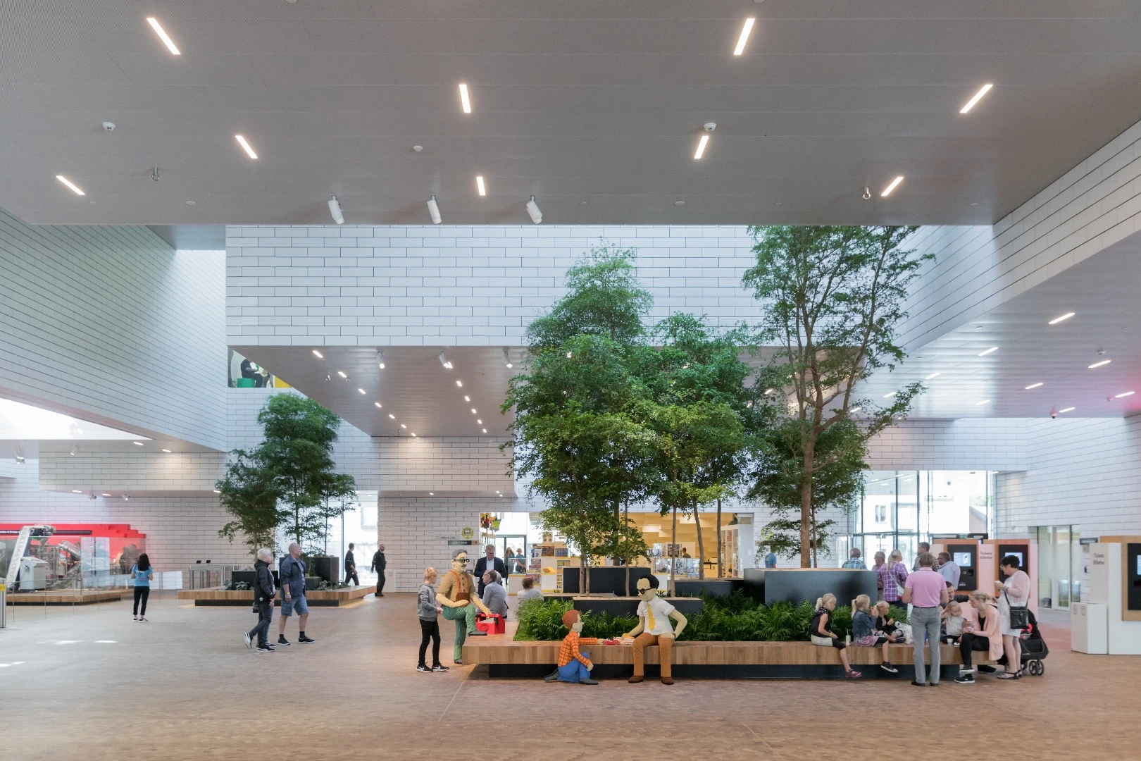 The Lego House's large central square is open to the public, allowing visitors and locals to take a shortcut through the building