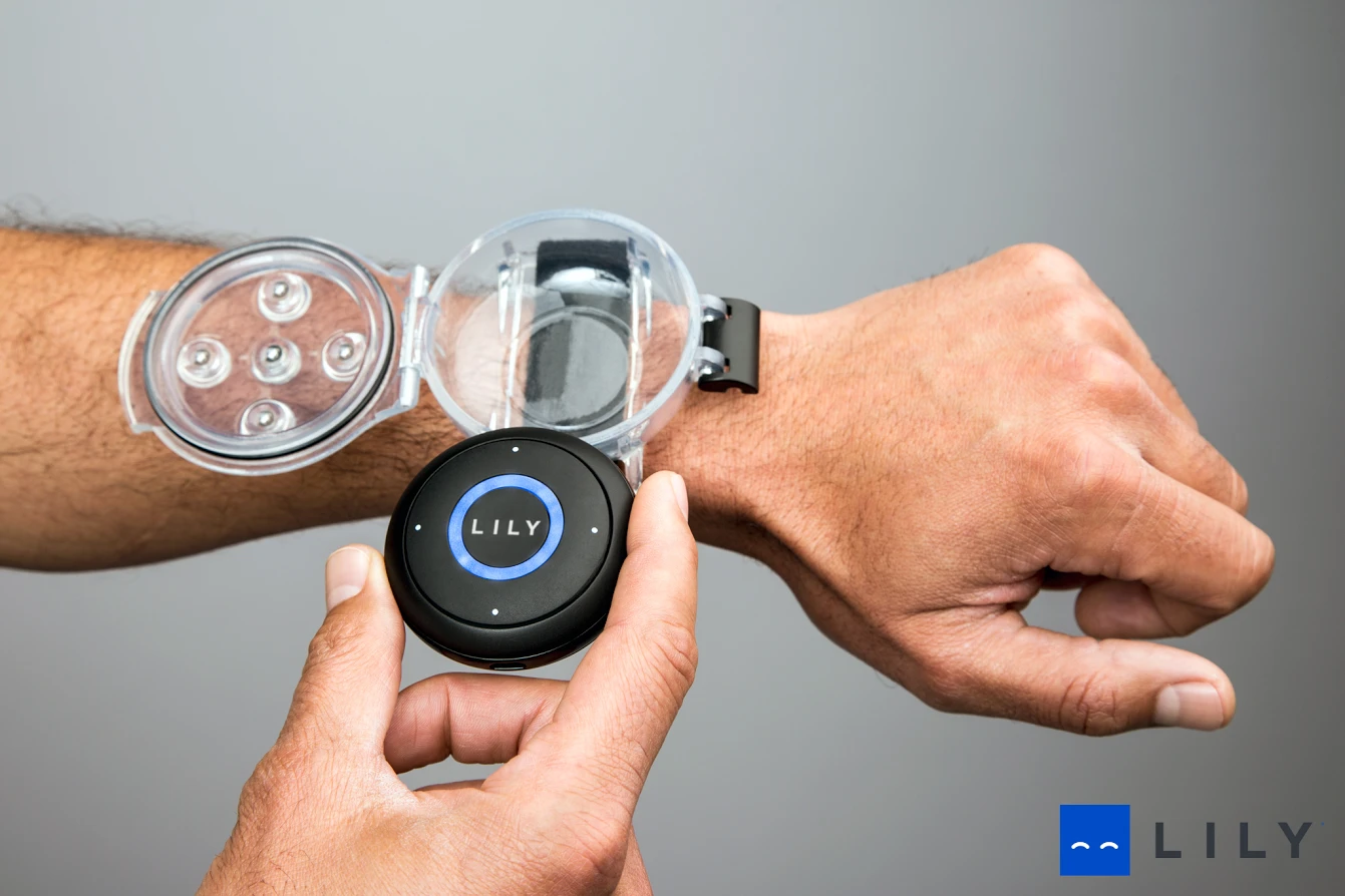 While in flight, Lily communicates with a disc-shaped tracking device that can be worn on the user's wrist