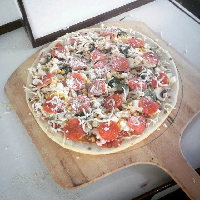 Pizza is ready for the oven