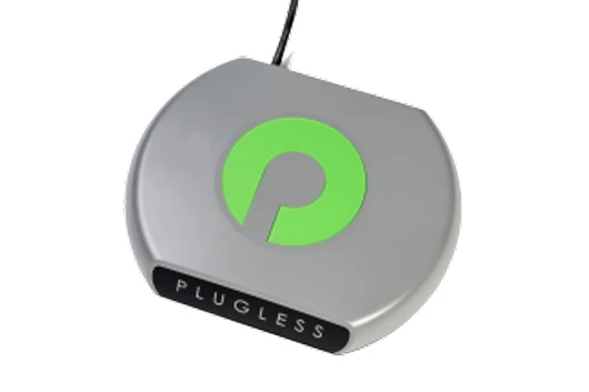 The Plugless Level 2 Electric Vehicle Charging System parking pad