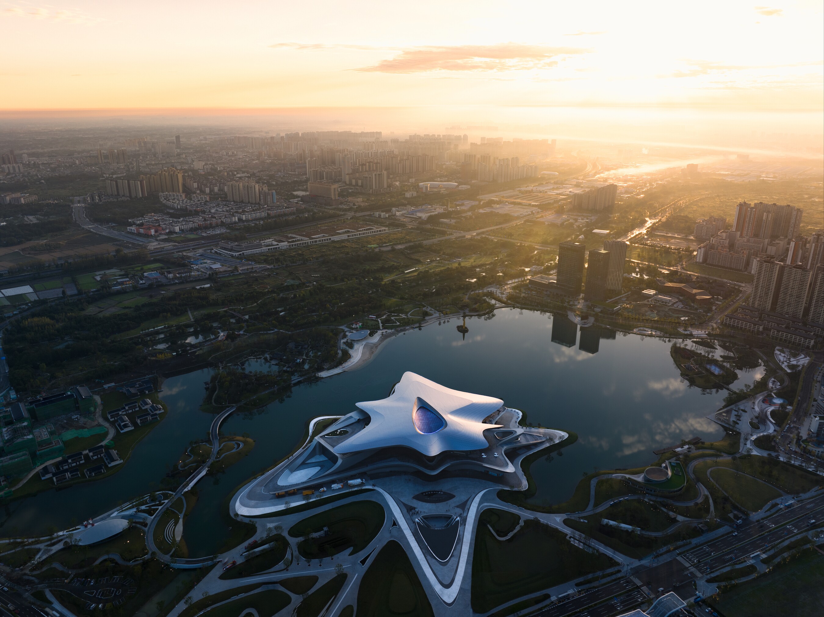 The Chengdu Science Fiction Museum's strange amorphous form is envisioned as an expanding nebula cloud with a star at its center