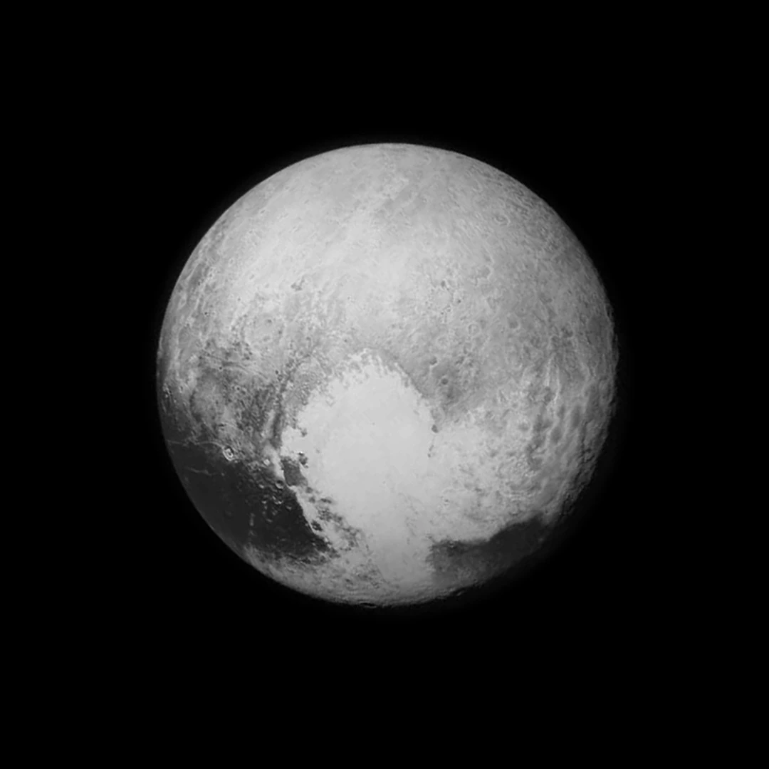 Black and white image of Pluto returned 16 hours before flyby