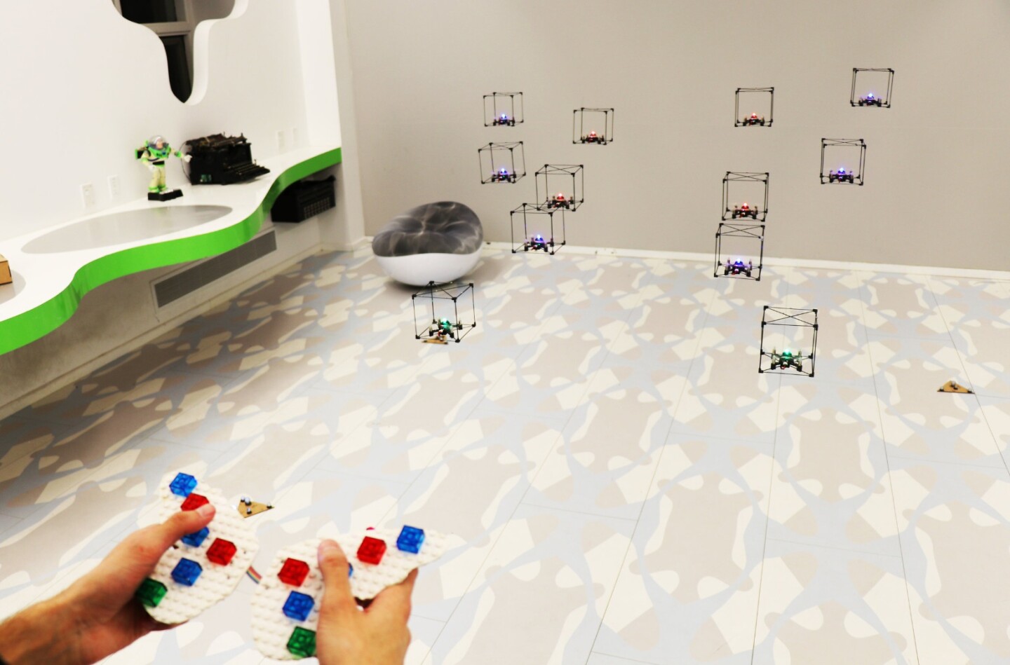 A system developed by Lego and Queen's University researchers sees drones recreate Lego creations in mid-air