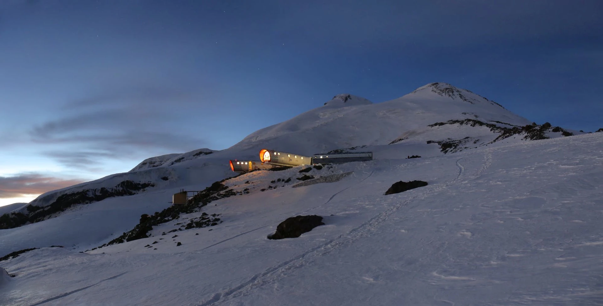 On the southern glacier of Mount Elbrus, in Russia's Caucasus mountain range, is this remarkably isolated hotel, a remote and energy-efficient building that sits 3,912 m (12,834 ft) above sea level, hence its name: LEAPrus 3912