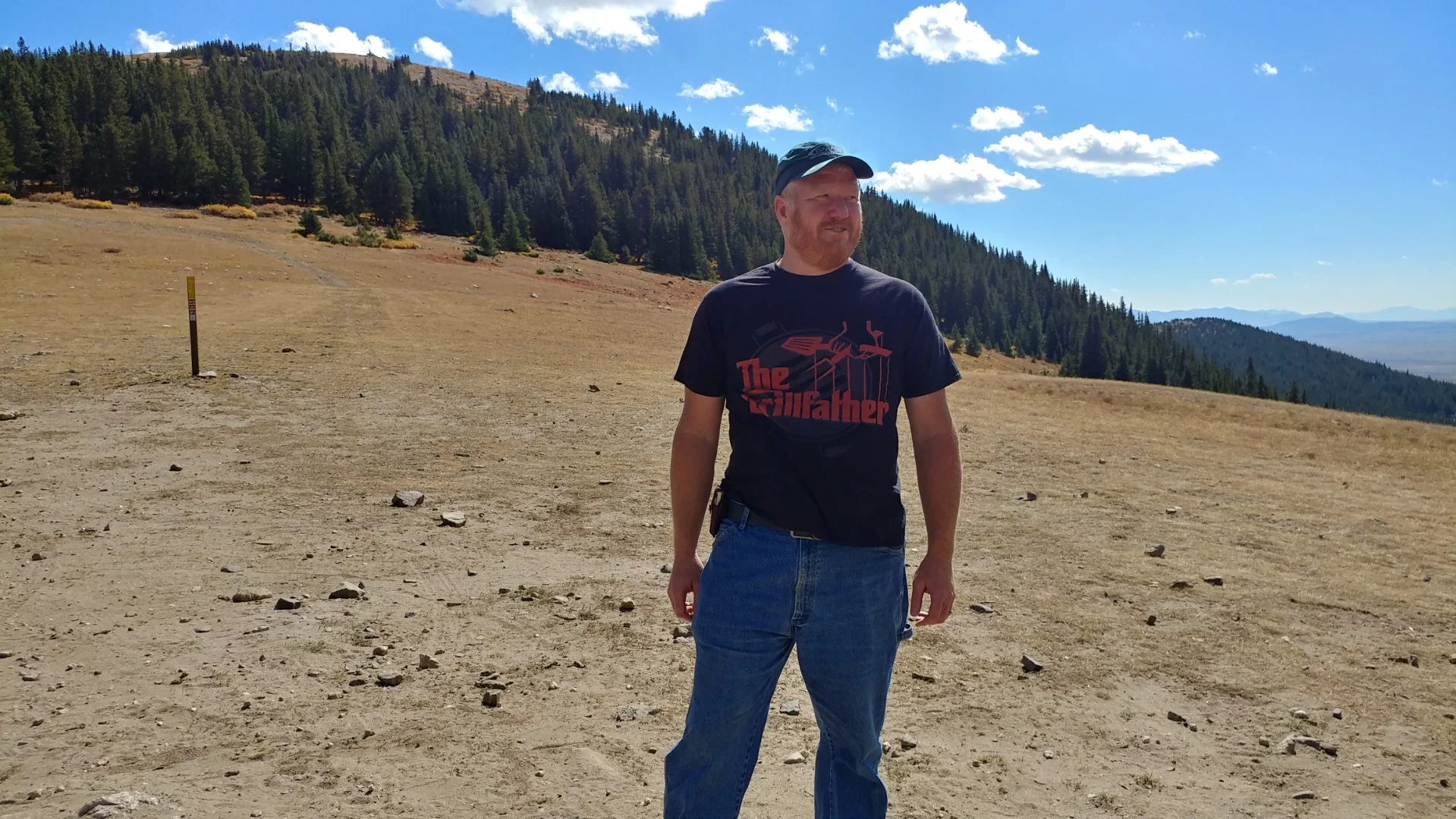 The author looks heroically off into the distance at the top of Georgia Pass