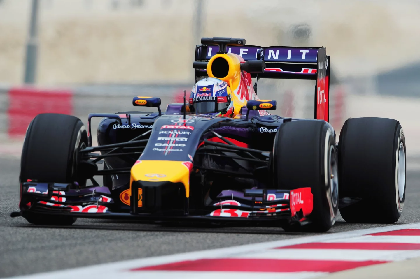 It might be a bit hard to cut through the visual clutter of the sponsorship stickers (you're looking at tens of millions of dollars in advertising right now), but if you look closely on Ricciardo's helmet and the nosecone, you'll see the Renault logo.
