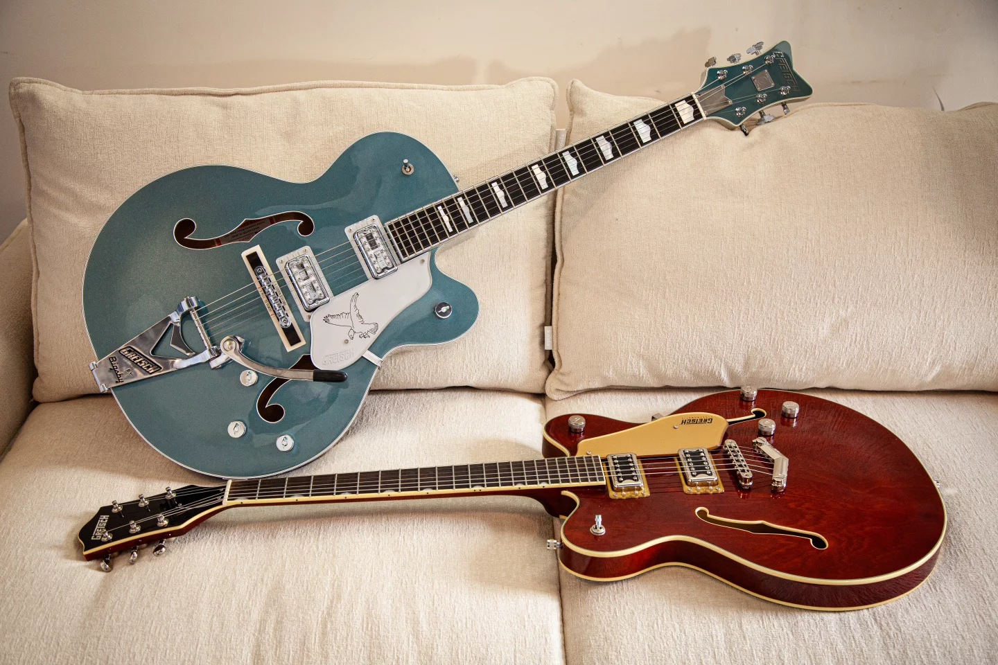 The G6136T-140 Double Platinum Falcon (the blue one) and G5622 Electromatic (the red one) - a pair of gorgeous guitars representing the top end and entry level of the Gretsch catalogue