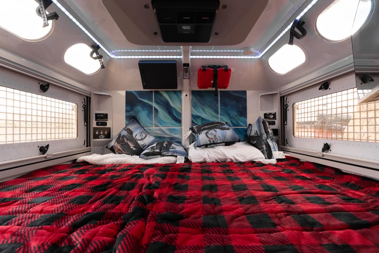 Much of the interior kit is secured around the primary king-size bed for easy access