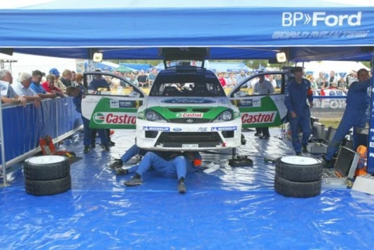 Toni Gardemeister's car gets the full attention of the BP Ford Rally team