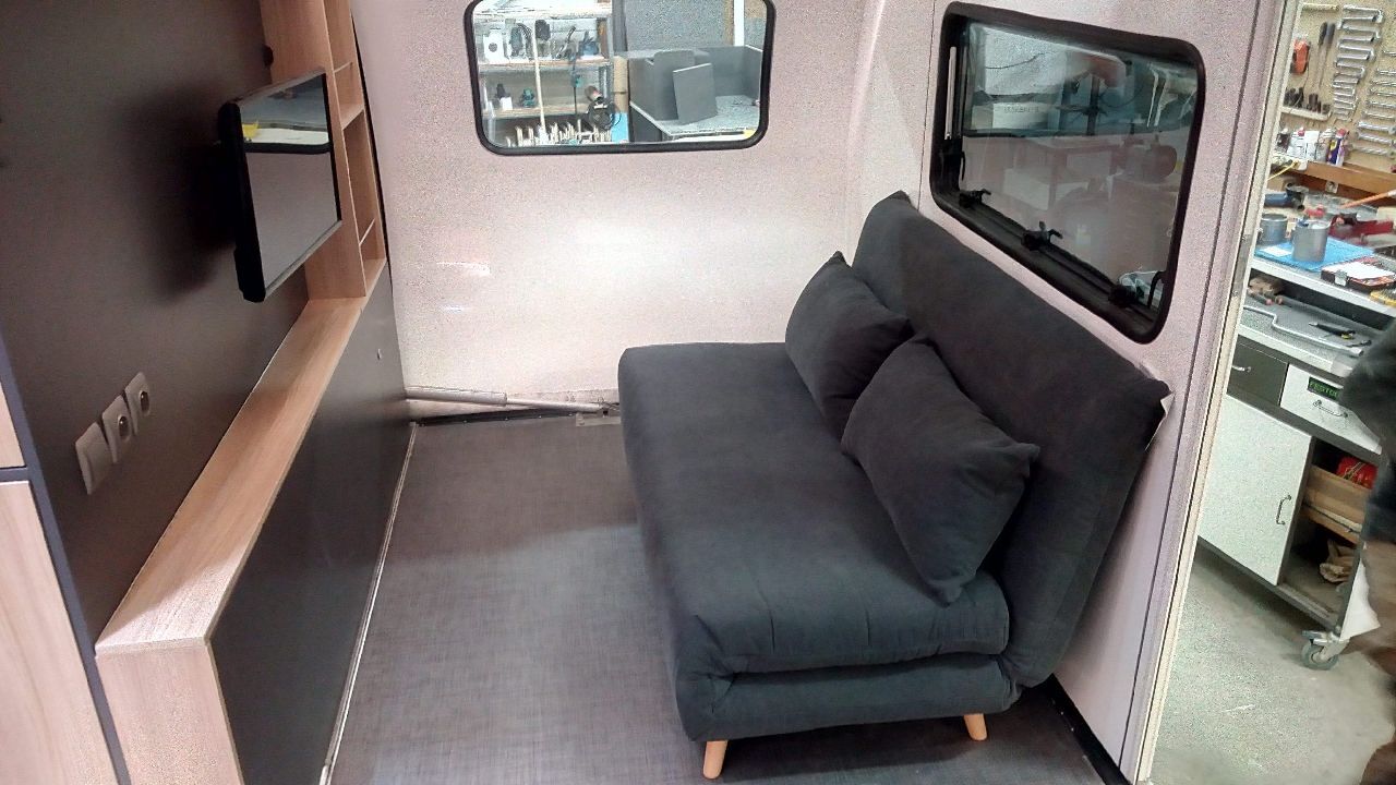 The convertible sofa offers additional sleeping space to bring the total up to six berths
