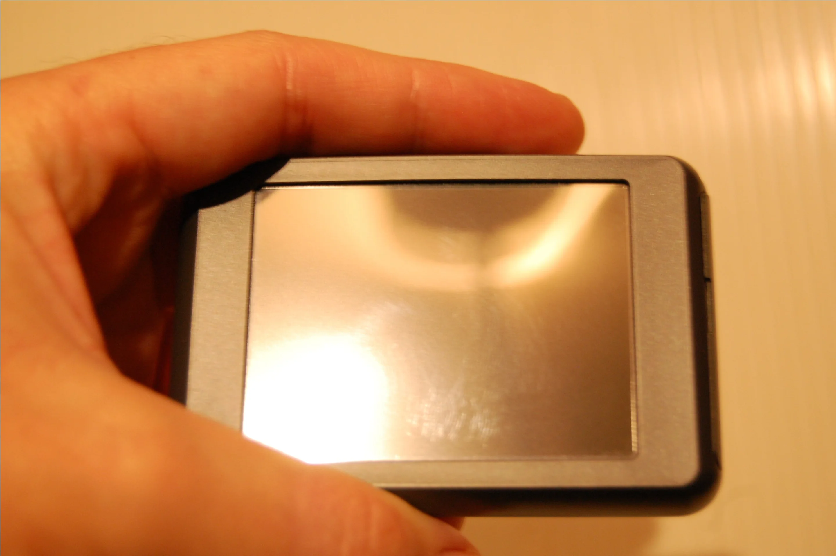 The gloss display is prone to glare in bright light and is a fingerprint magnet