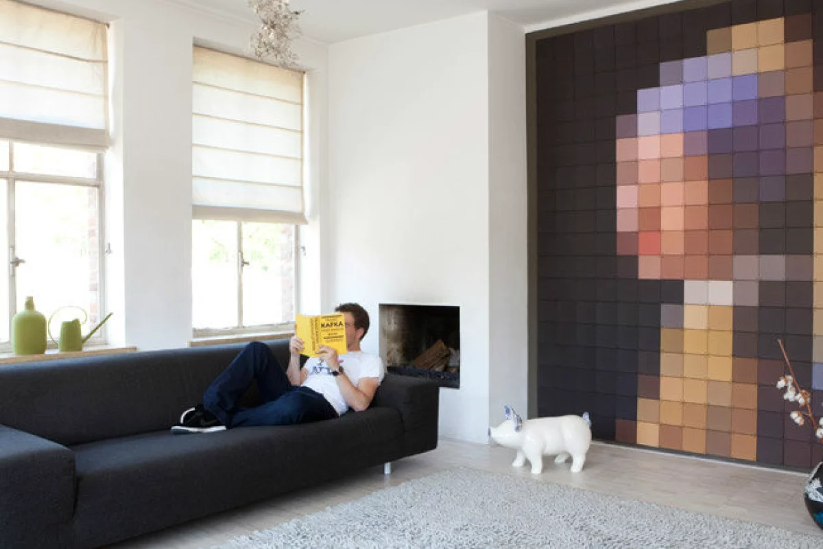 ixxi pixel art rendering of Vermeer's 'Girl with a Pearl Earring'