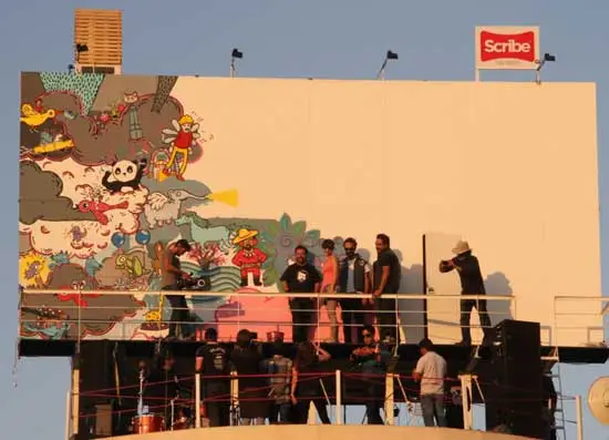 People can only enter and exit through a door concealed on the front of the billboard, though a small balcony does protrude from the back