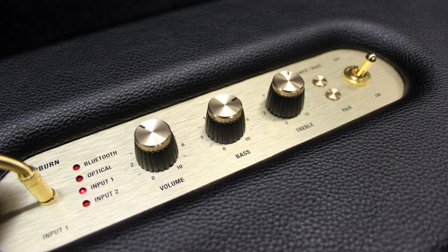 Woburn's cabinet is covered in the same kind of material that Marshall uses for its iconic amps, and gold-colored volume and tone knobs sit up top