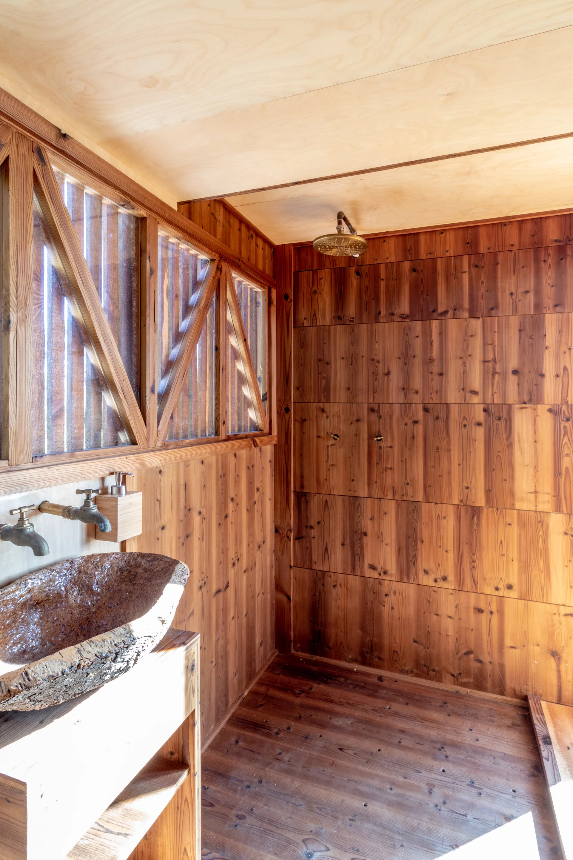 The Ursa's bathroom includes a shower, sink, and composting toilet