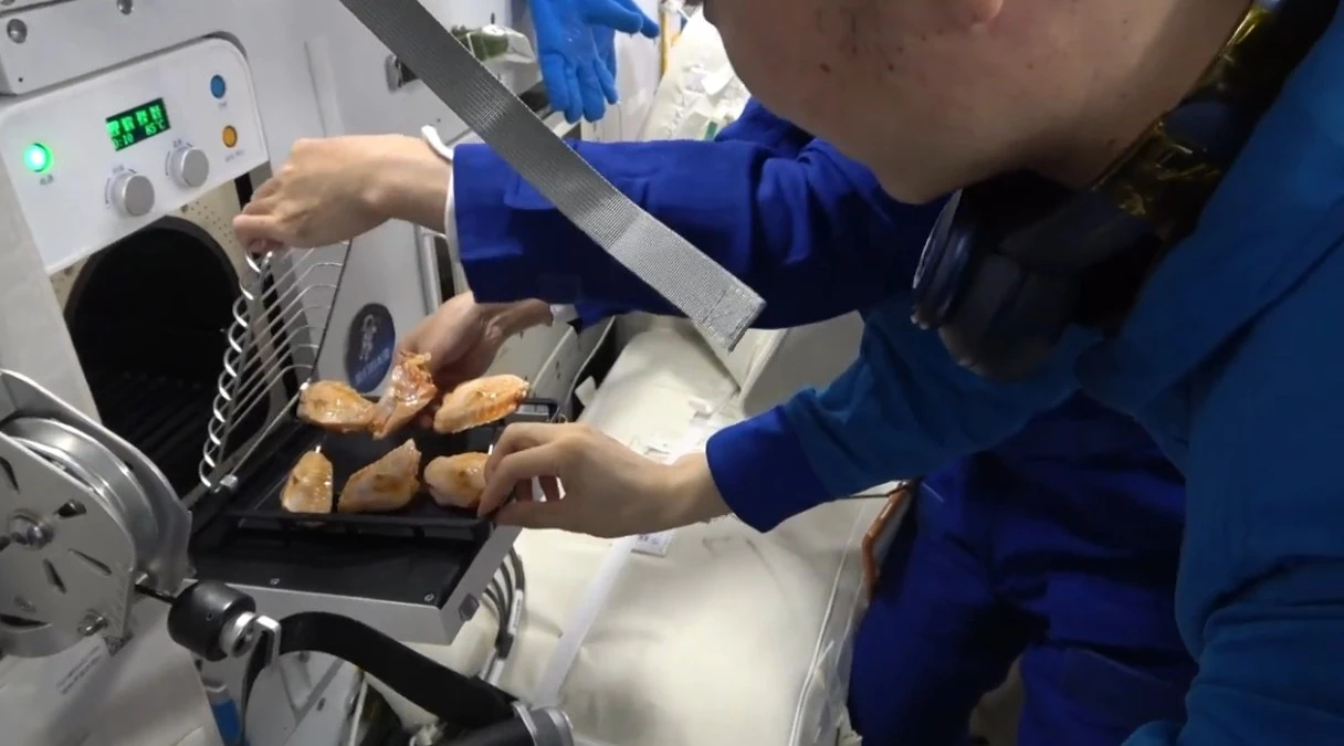 Putting the chicken in the oven