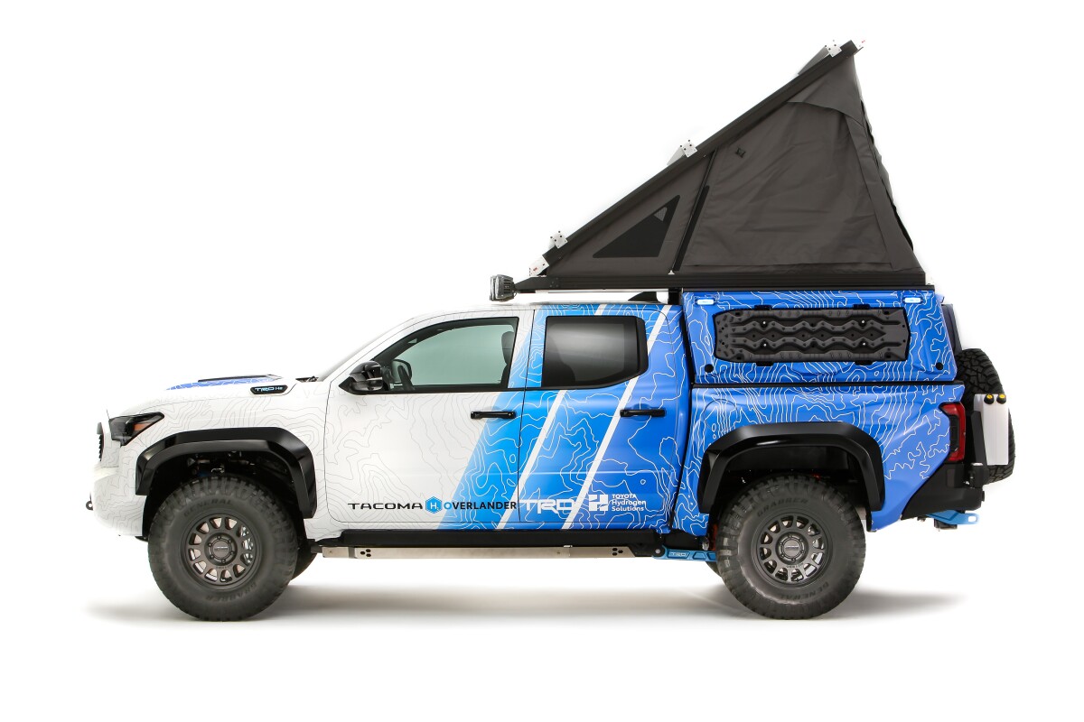 Light Toyota Tacoma camper truck makes its own water supply