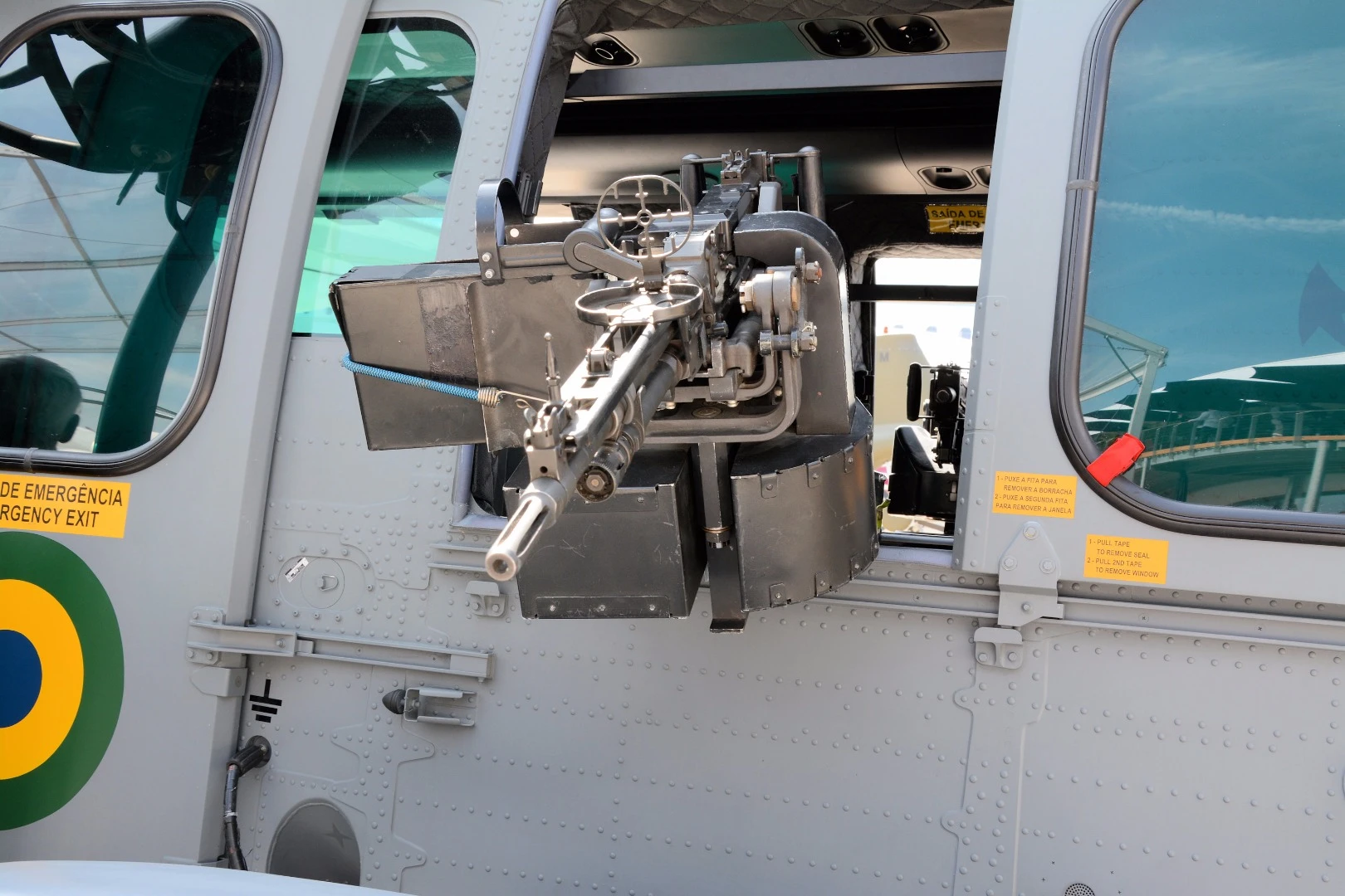 The 7.62 mm machine gun in the forward sliding window of this H225M Caracal helicopter has Gizmag in its sights