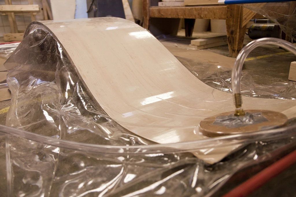 Two zipshape panels were then interlocked together to form a curved structure, glued together and vacuum-sealed in plastic bags