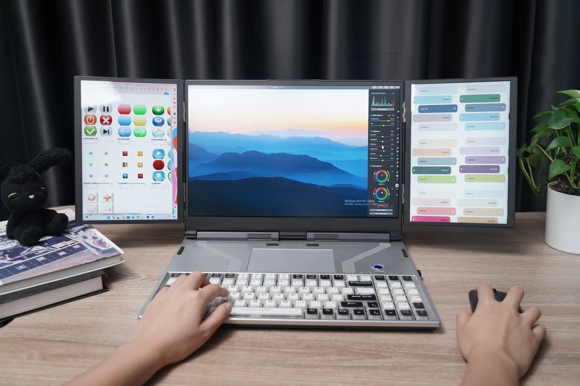 Triple-screen laptop merges immersion and portability