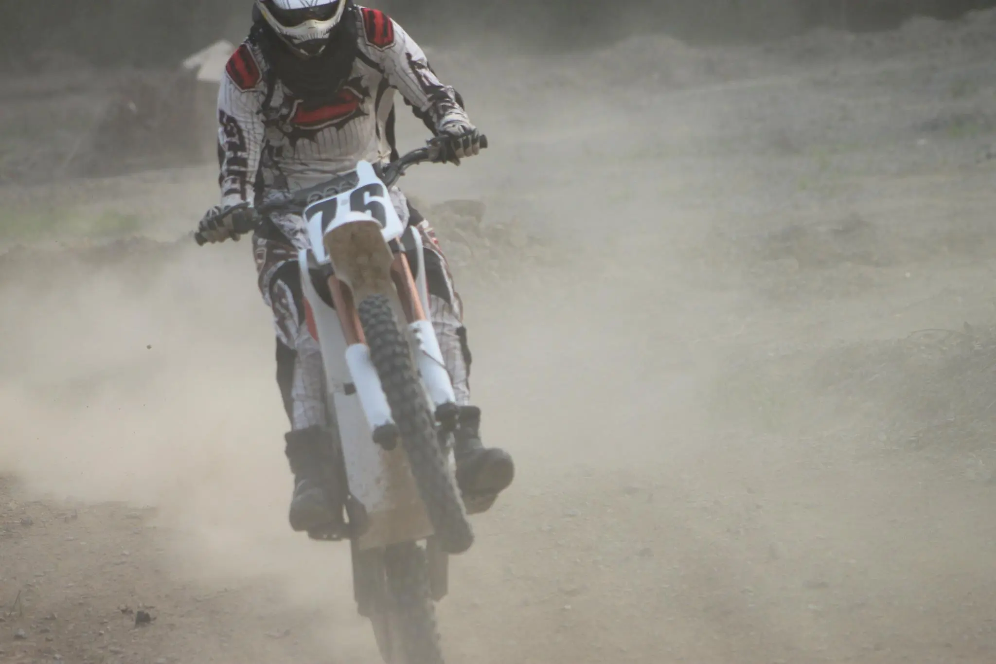 There's still an awful lot of dust, but no tailpipe emissions, from the Zero MX electric bikes used at Dark Green