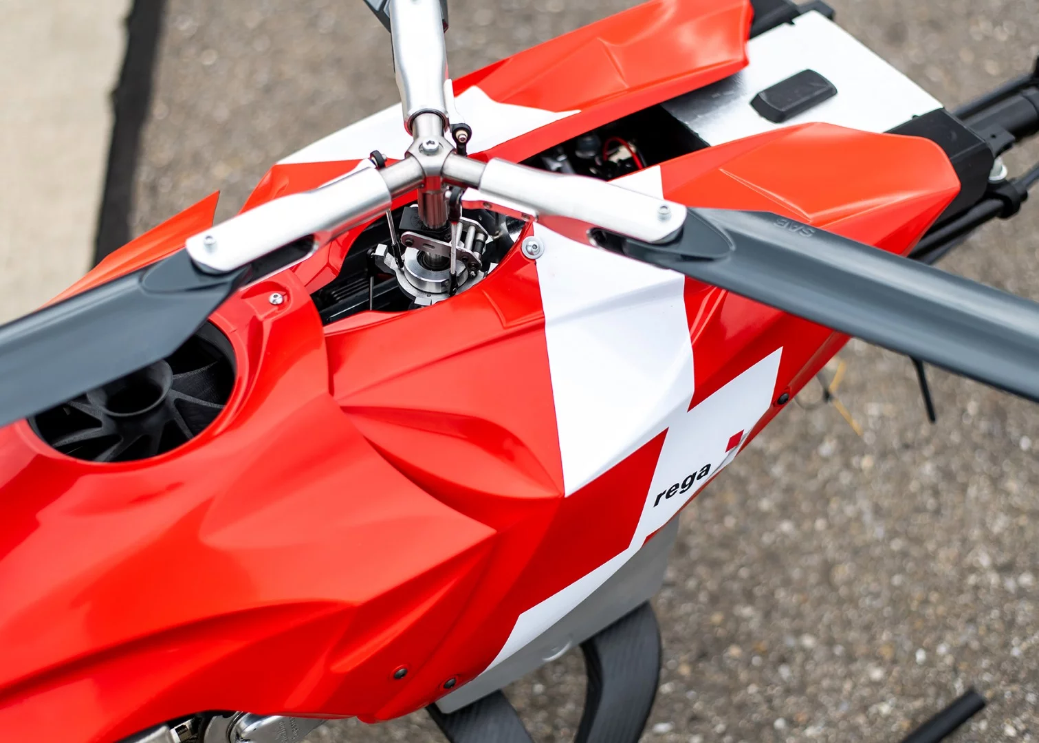 With three rotor blades and an array of on-board sensors, the Rega drone resembles a miniature helicopter