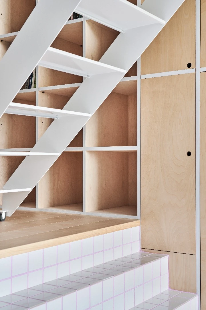 Stairs and shelving inside the Muzha Micro Flat