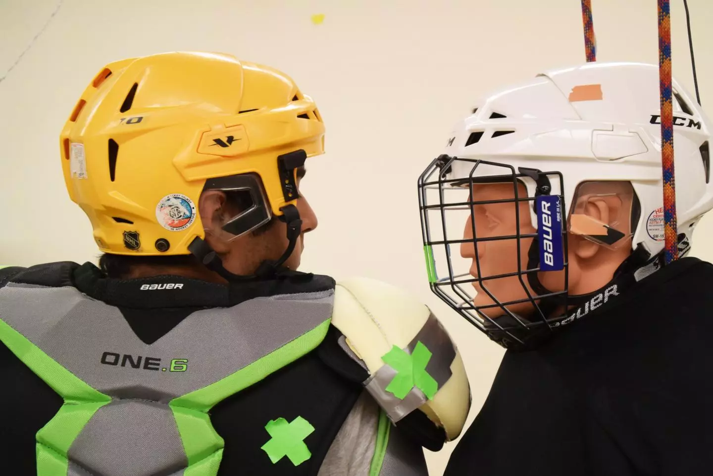The scientists had a group of hockey players deliver shoulder checks to the head of a sensor-equipped mannequin