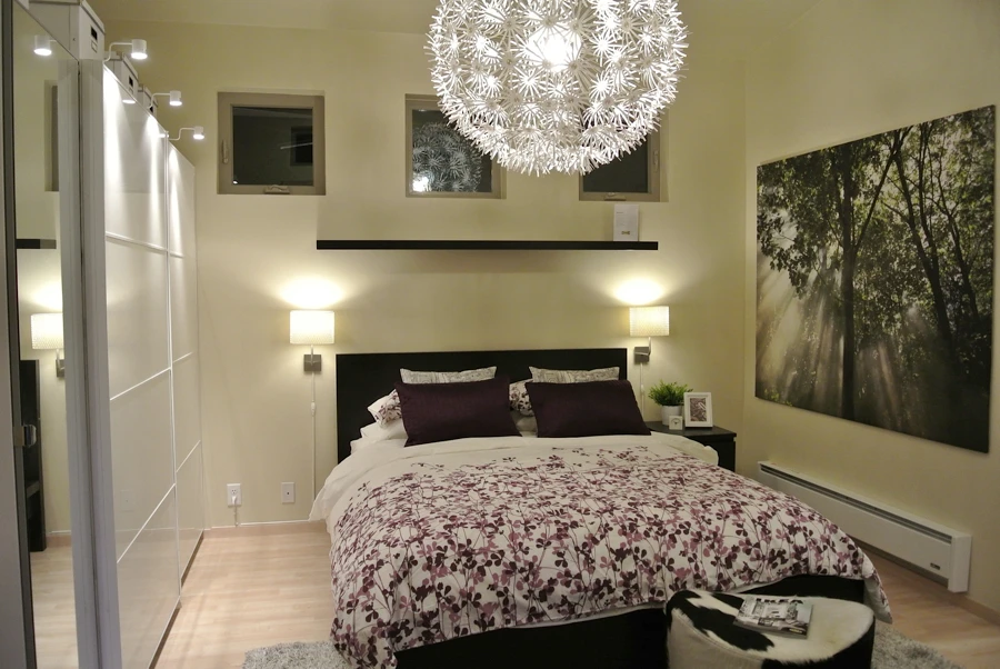The bedroom features a functional IKEA built-in series of closet systems
