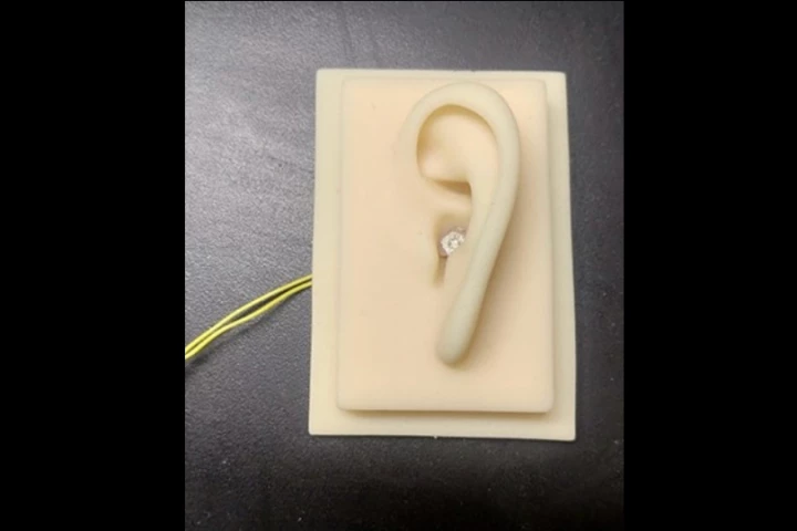 The prototype device was successfully tested inside a model human ear