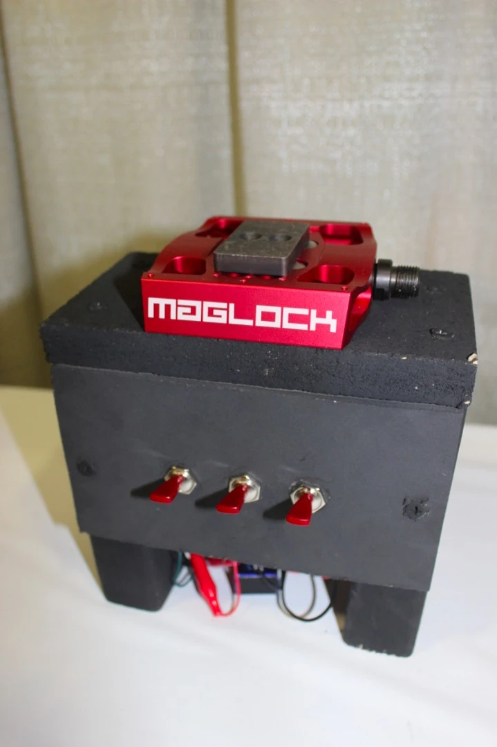 This setup demonstrates the idea behind a proposed electromagnetic version of Maglock magnetic pedals – if the bike were tipping over, the magnets could automatically shut off to release the rider's feet