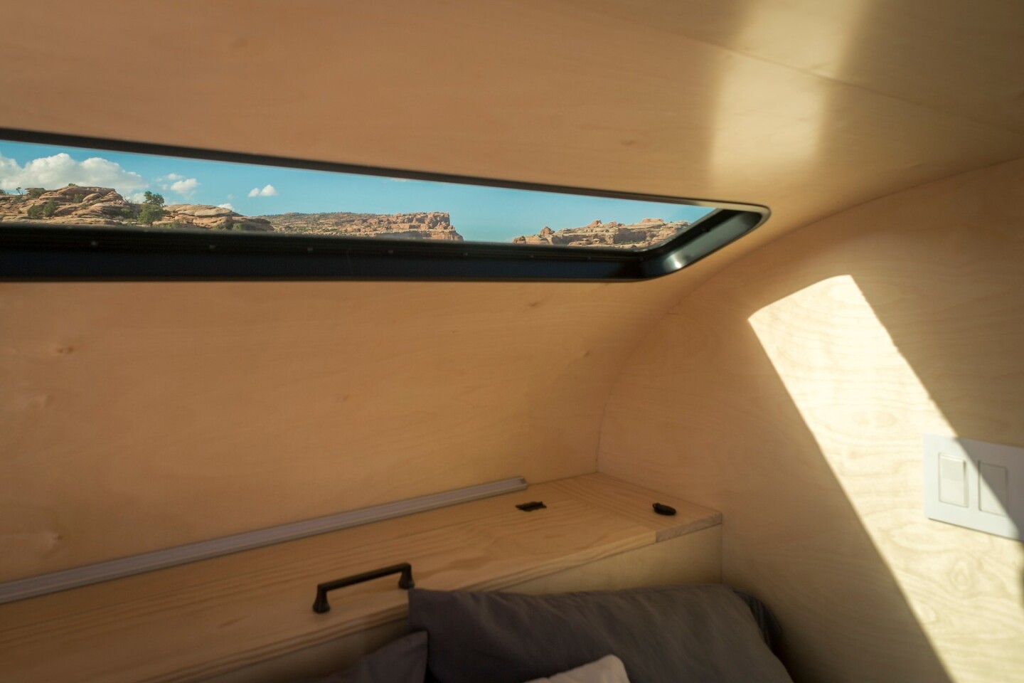 The wide-stretched stargazer window offers views above
