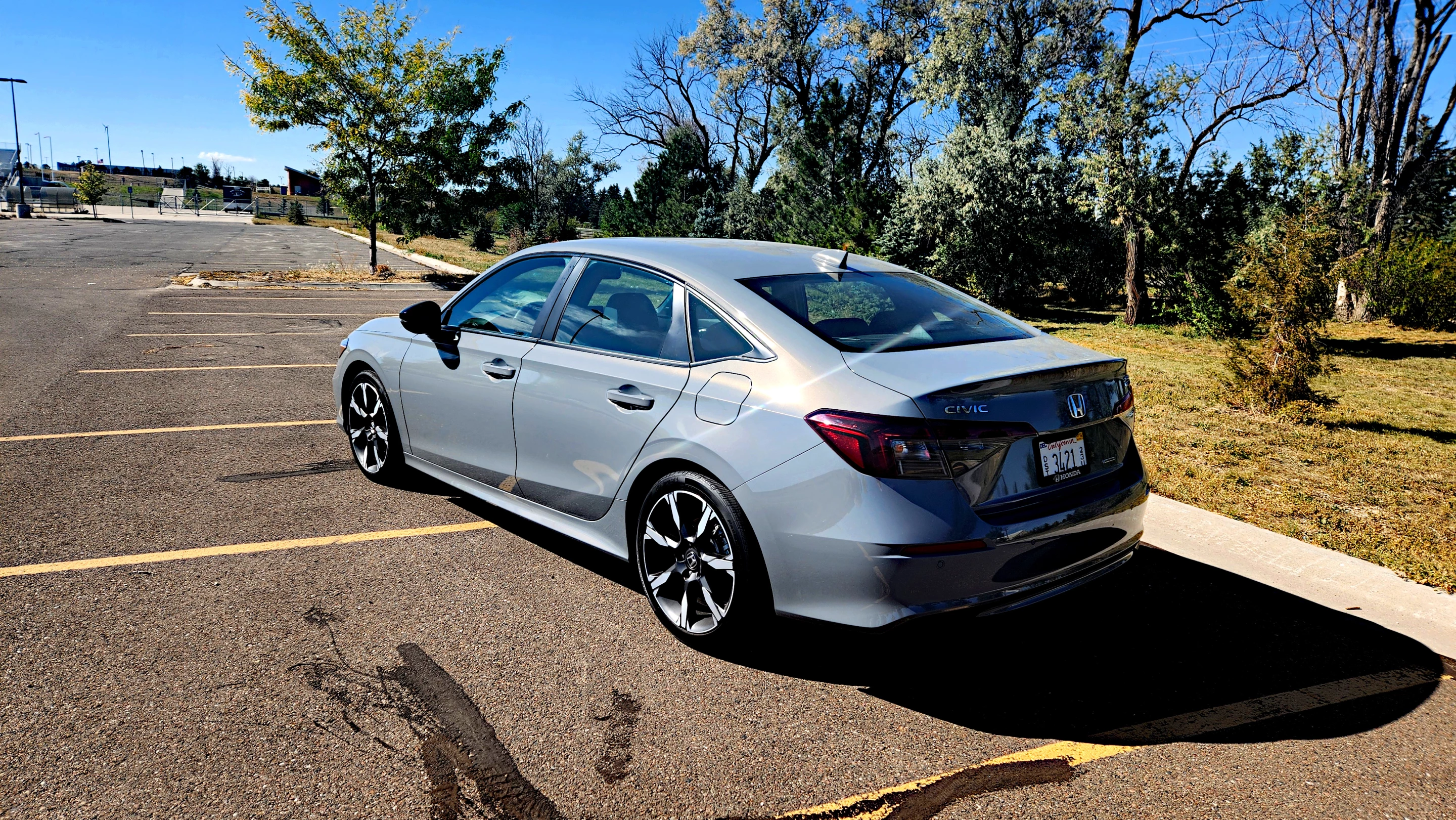 There's a good amount of cargo space in the 2025 Honda Civic Hybrid, but the back seats are comparatively minimal