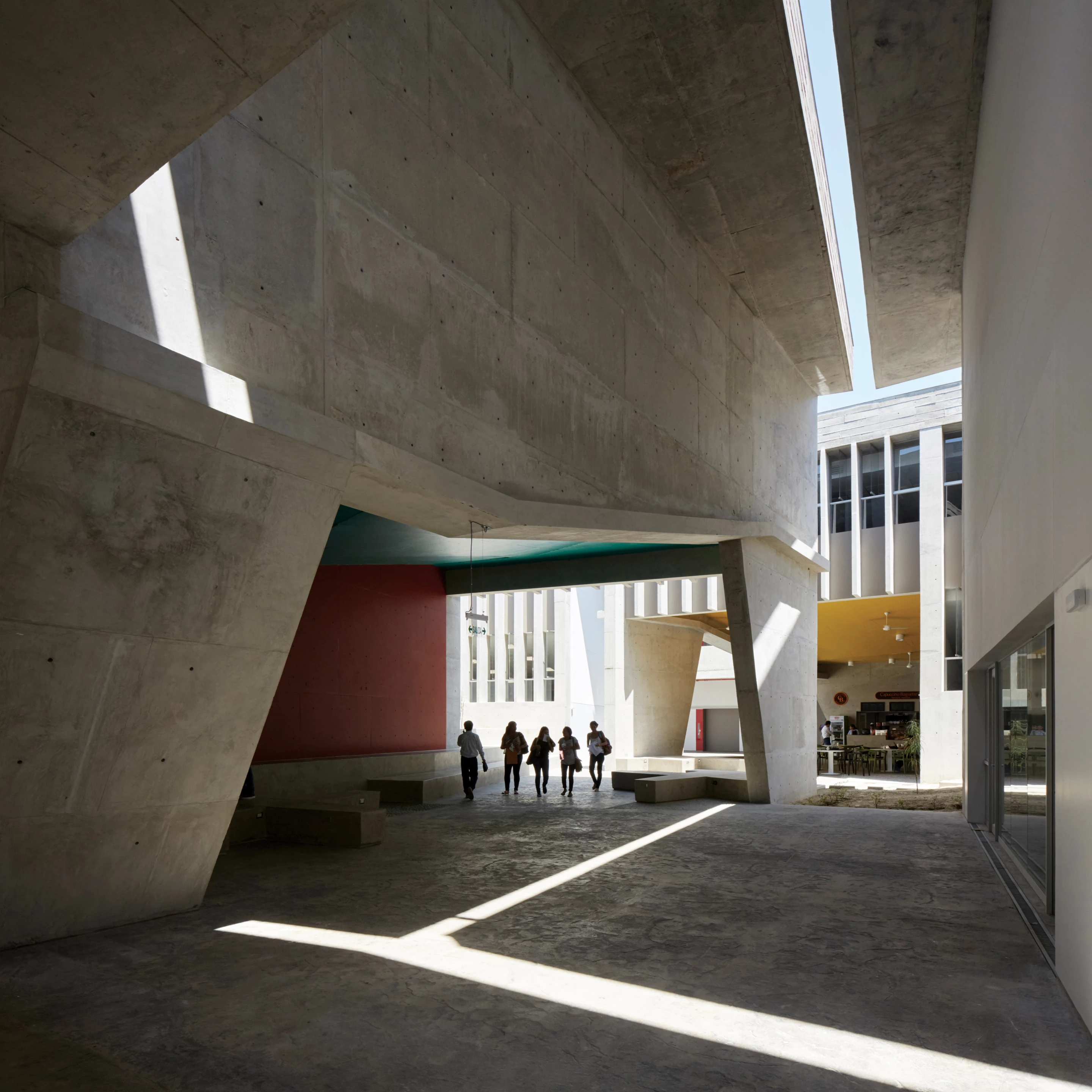 Archways and angles create dynamic light-play at Edificio E, University of Piura