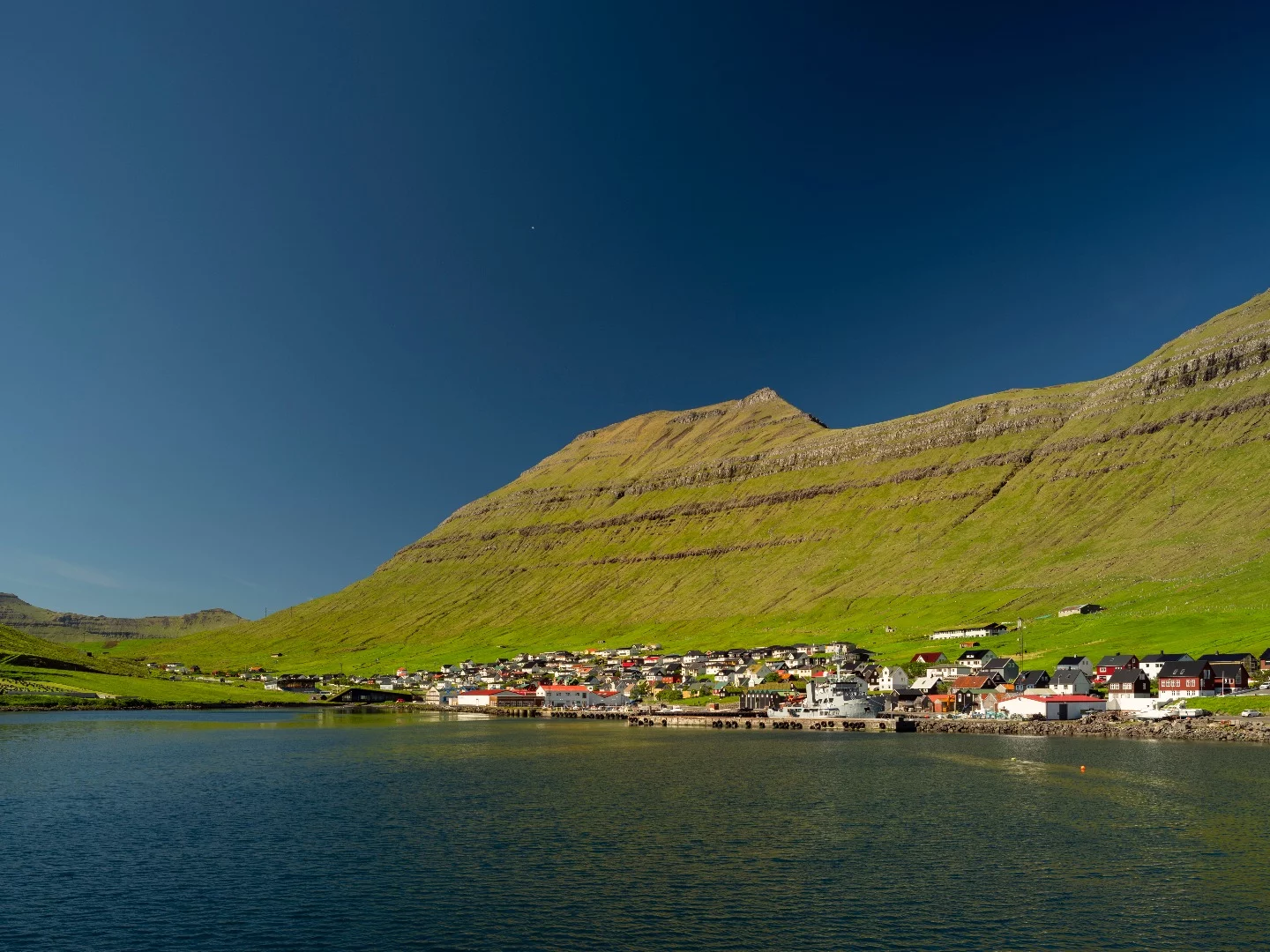 The village of Norðragøta in the Faroe Islands is home to a new town hall that doubles as a grass-covered pedestrian bridge