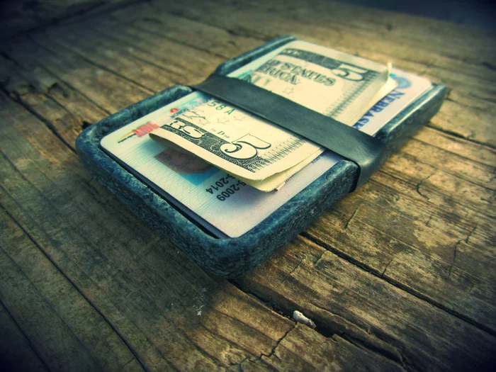 A Denimite wallet, with a band made from a recycled bicycle inner tube