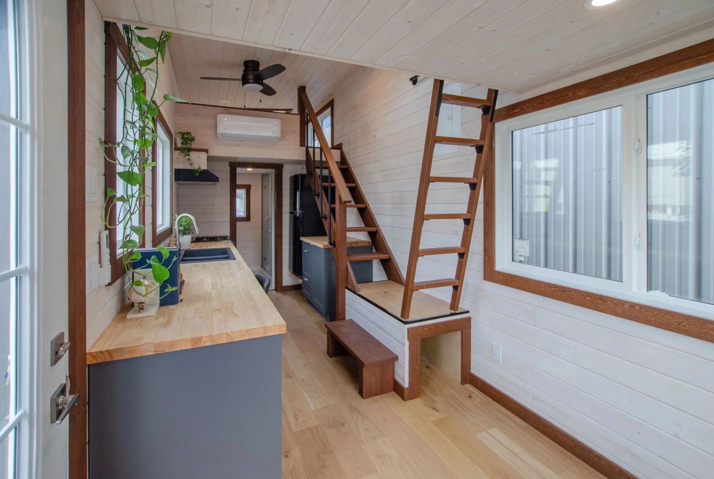 One of the Pacific Wren's bedrooms is reached by wooden steps, while the other is reached by a removable ladder