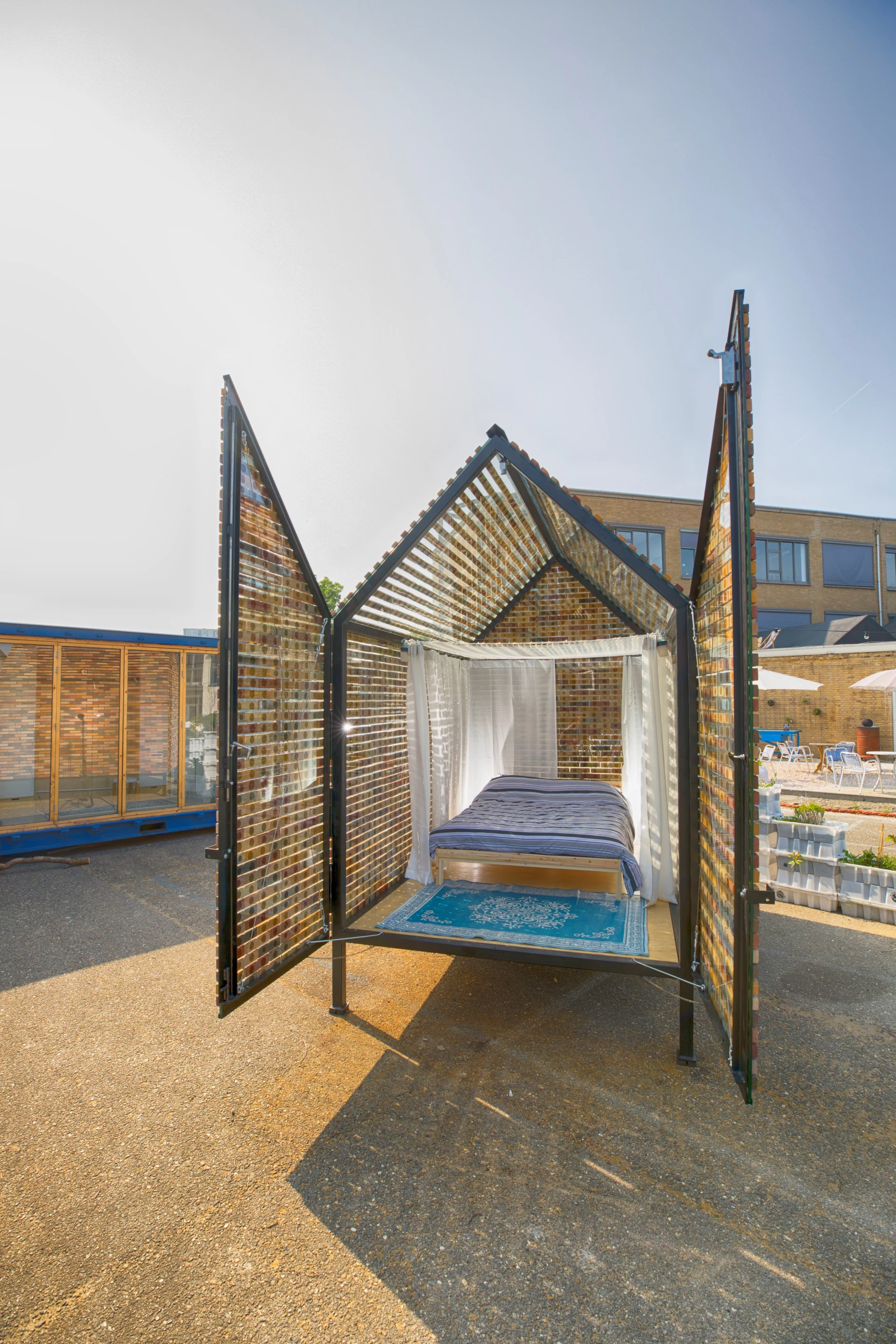 Floating Bricks sleeps up to three people: two on a double bed and a third on a small hammock that's installed inside