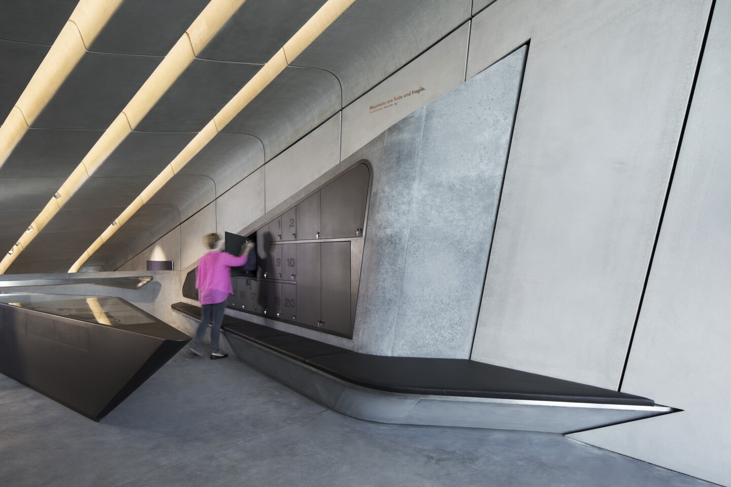 The interior is aptly likened to a grotto by Hadid herself, and results in a series of areas to explore